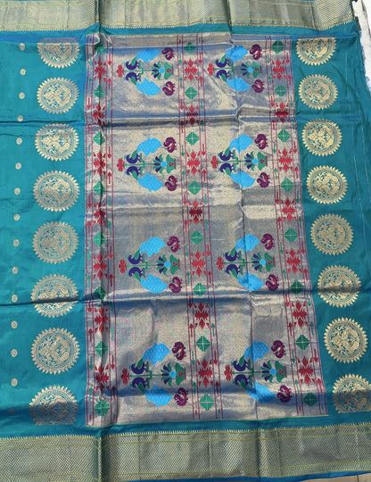 Narayanpet Silk Saree Peacock Green Colored Complemented with a Peacock Green Zari Border.