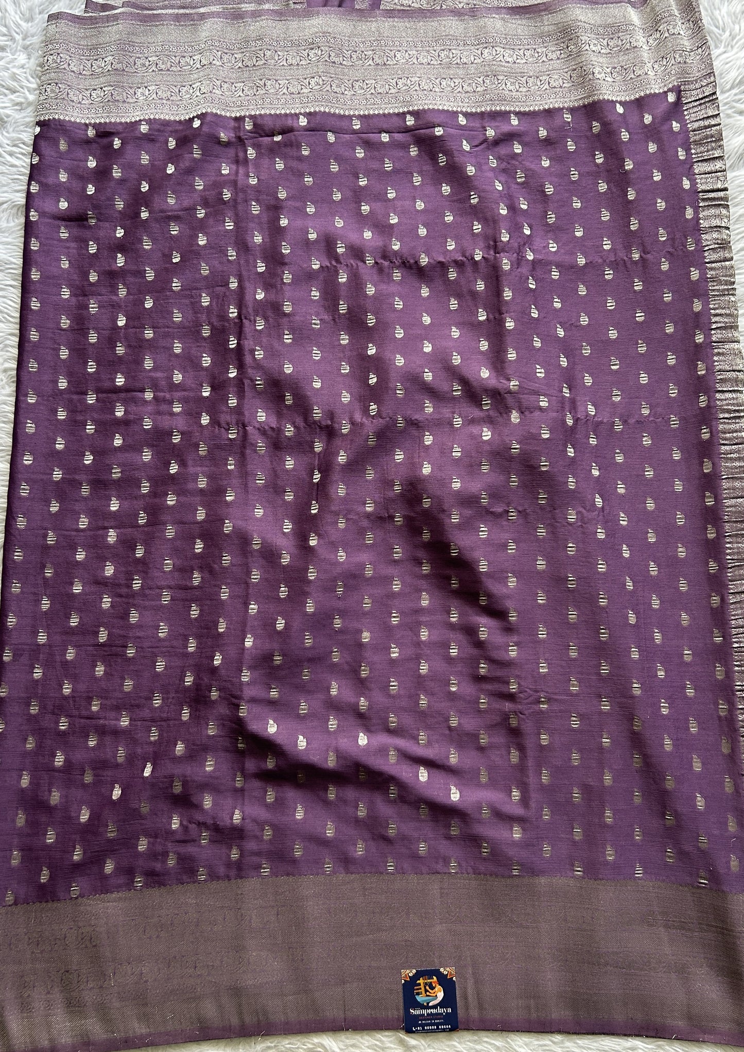 Semi Georgette Saree Dark Purple Colored Complemented with a Zari Border. - Sampradaya Designer Studio