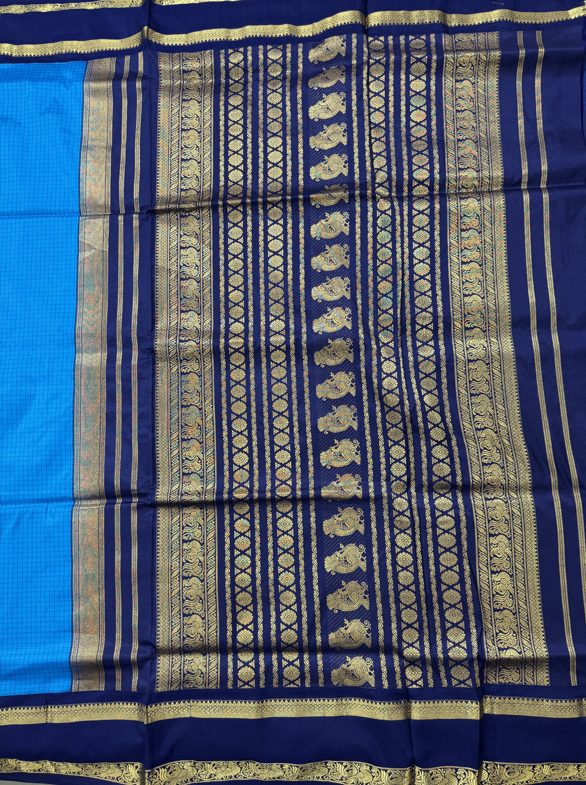 Narayanpet Silk Saree Blue Colored Complemented with a Ink Blue Zari Border.