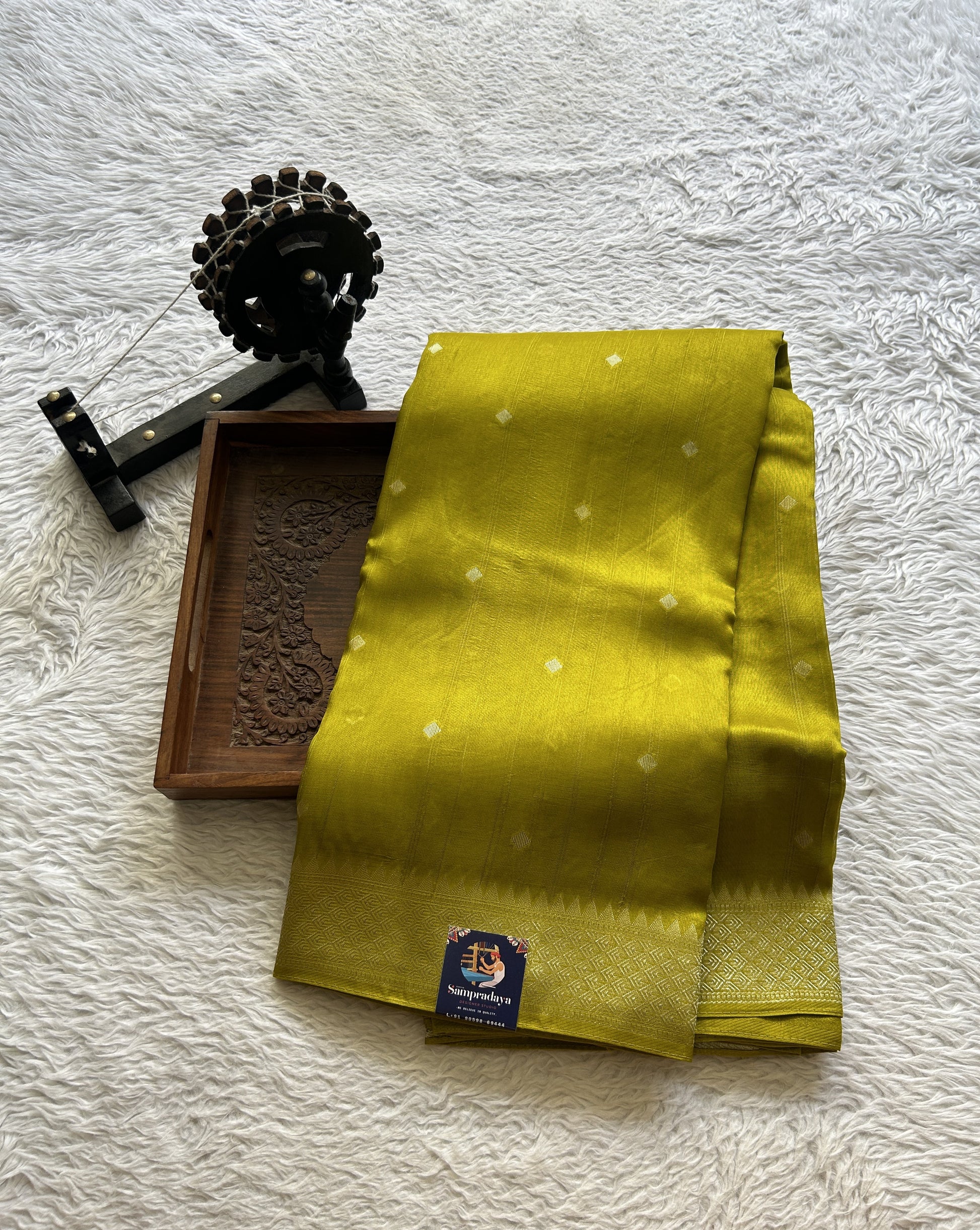 Banarasi Tussar Georgette Saree Olive Green Colored Paired with a Zari Border. - Sampradaya Designer Studio