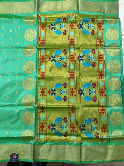 Narayanpet Silk Saree Light Green Colored Complemented with a Green Zari Border.