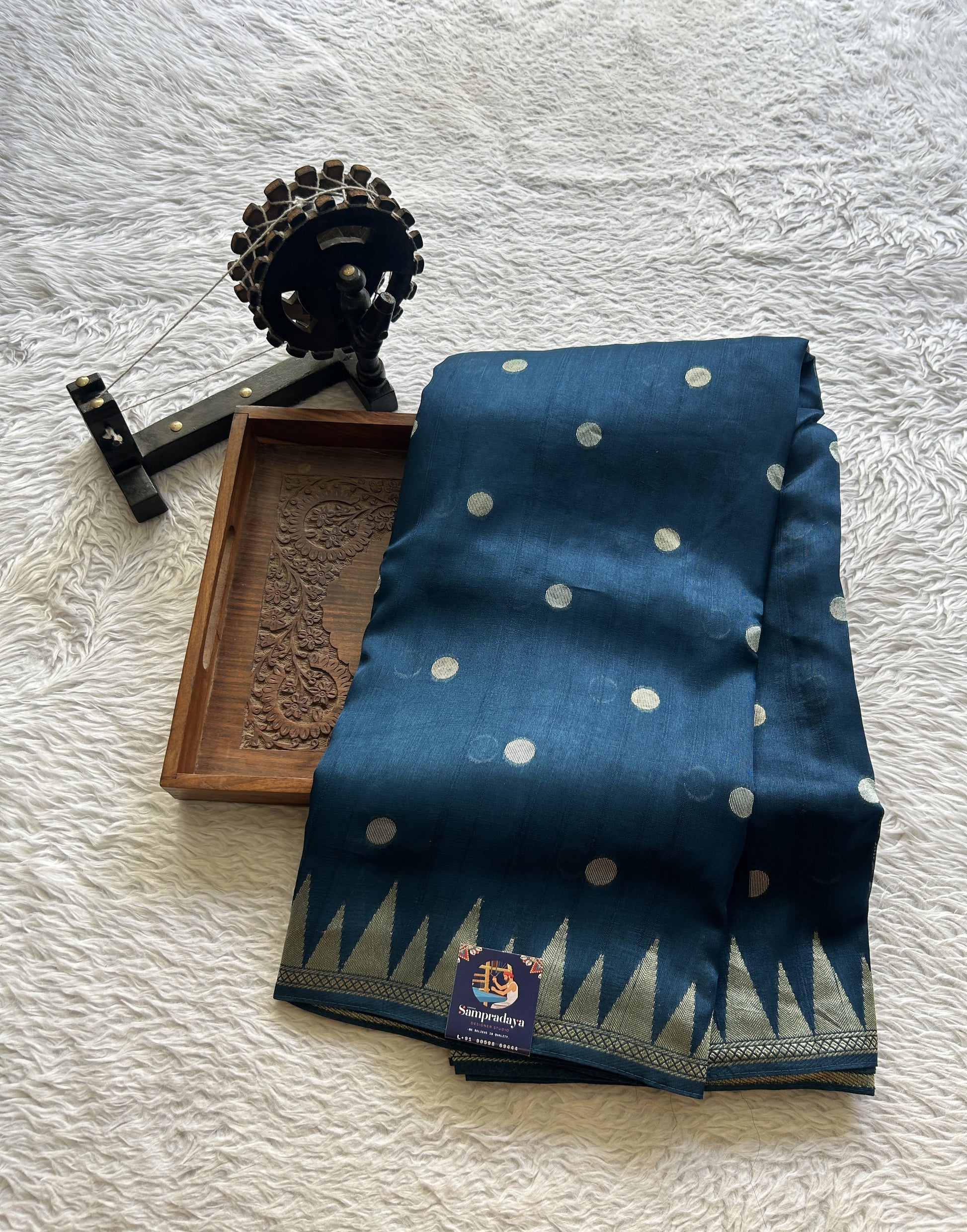 Banarasi Tussar Georgette Saree Peacock Blue Colored Paired with a Temple Border. - Sampradaya Designer Studio
