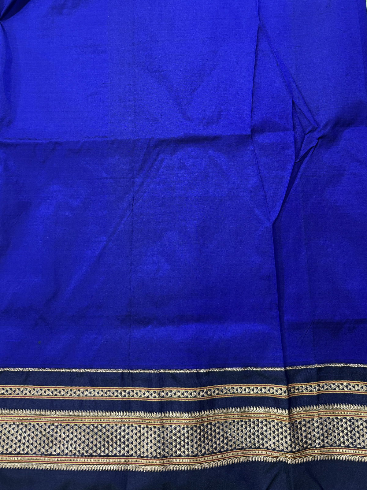 Narayanpet Silk Saree  Light Green Colored Complemented with a Ink Blue Zari Border.