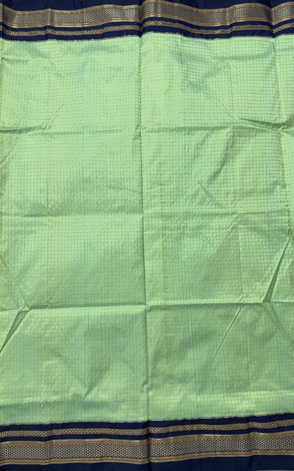 Narayanpet Silk Saree  Light Green Colored Complemented with a Ink Blue Zari Border.