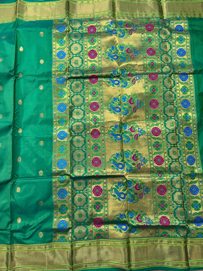 Narayanpet Silk Saree  Green Colored Complemented with a Green Zari Border.
