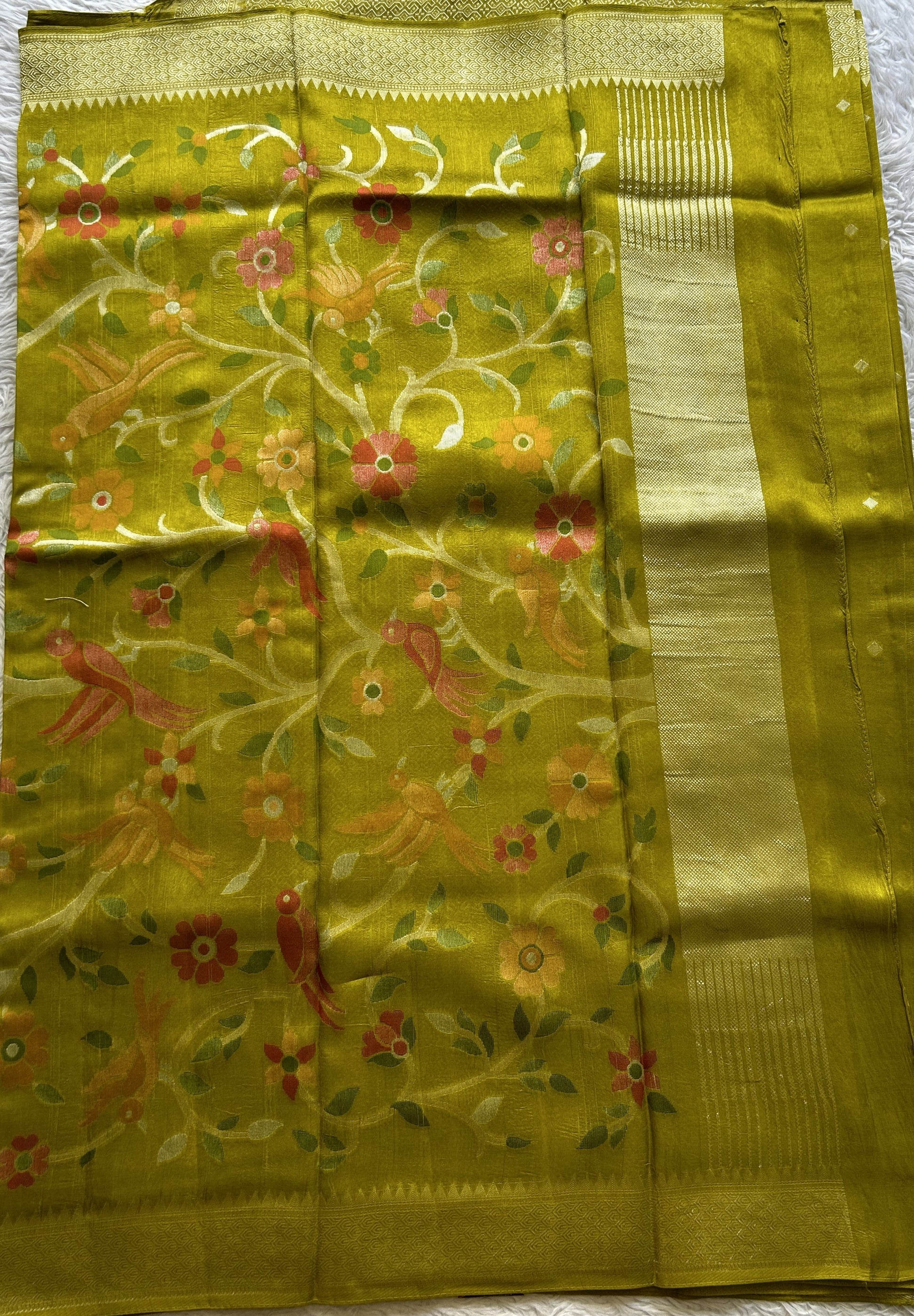 Banarasi Tussar Georgette Saree Olive Green Colored Paired with a Zari Border. - Sampradaya Designer Studio