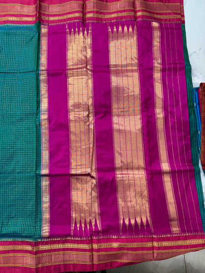 Narayanpet Silk Saree  Green Colored Complemented with a Pink Zari Border.