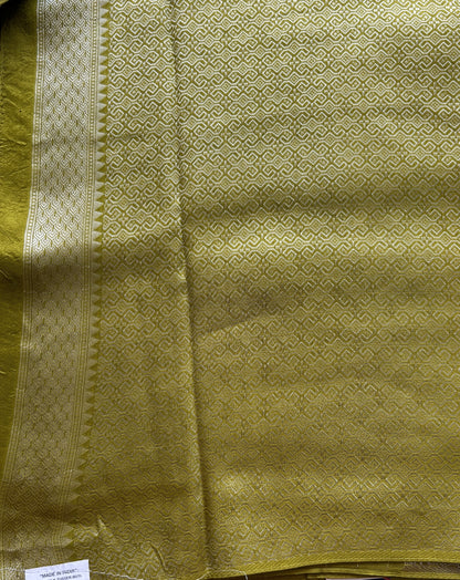 Banarasi Tussar Georgette Saree Olive Green Colored Paired with a Zari Border. - Sampradaya Designer Studio