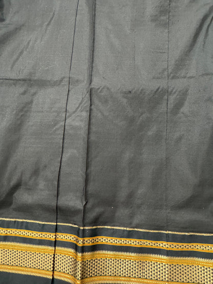 Narayanpet Silk Saree  Blue Colored Complemented with a Black Zari Border.