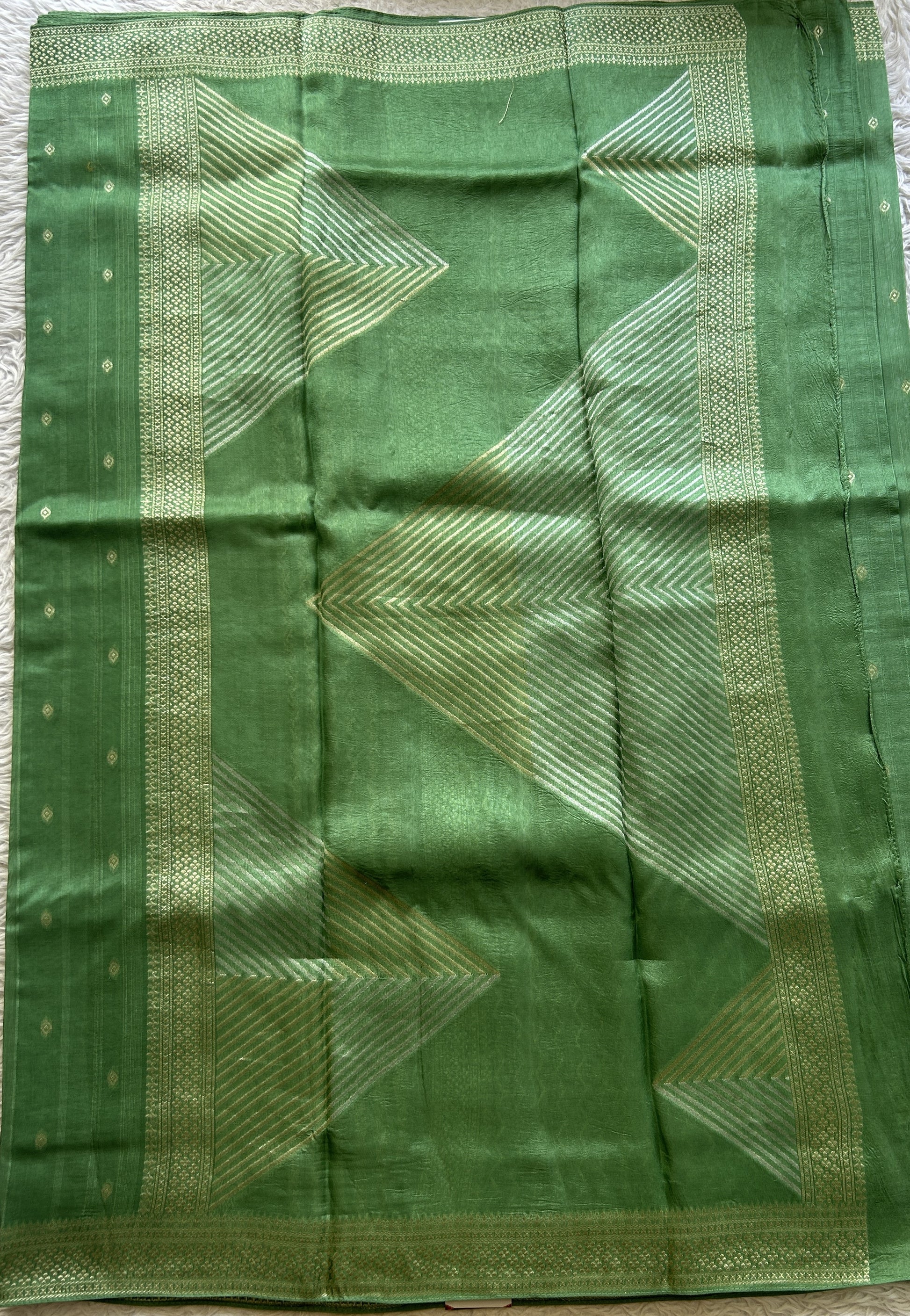 Banarasi Tussar Georgette Saree Sea Green Colored Paired with a Zari Border. - Sampradaya Designer Studio