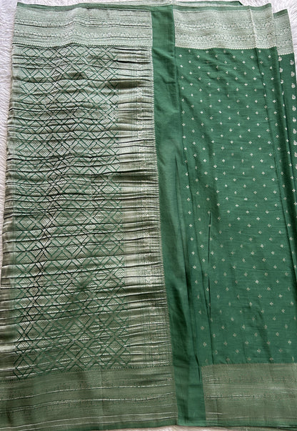 Semi Georgette Saree Green Colored Complemented with a Zari Border. - Sampradaya Designer Studio