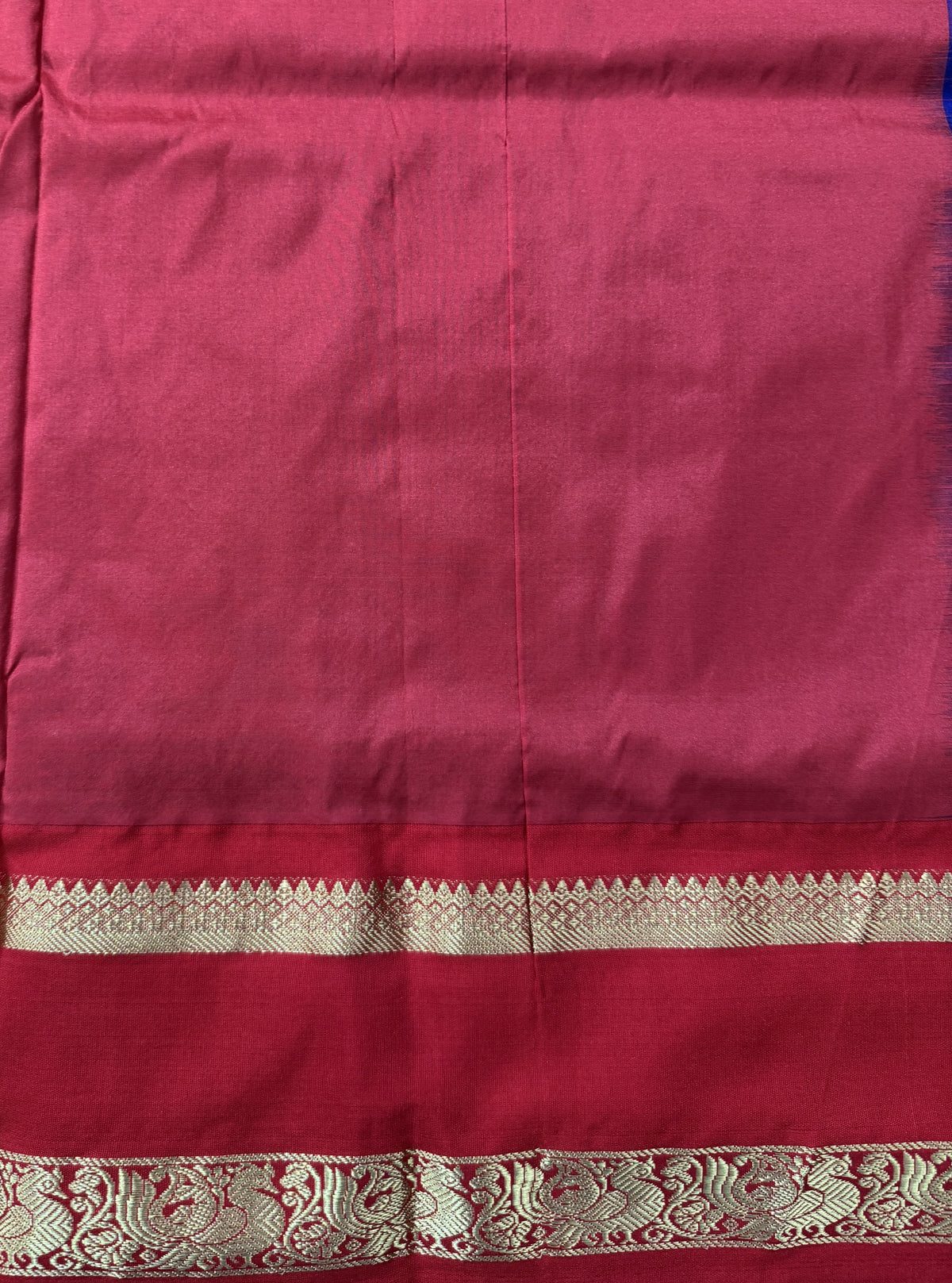 Narayanpet Silk Saree Purple Colored Complemented with a Red Zari Border.