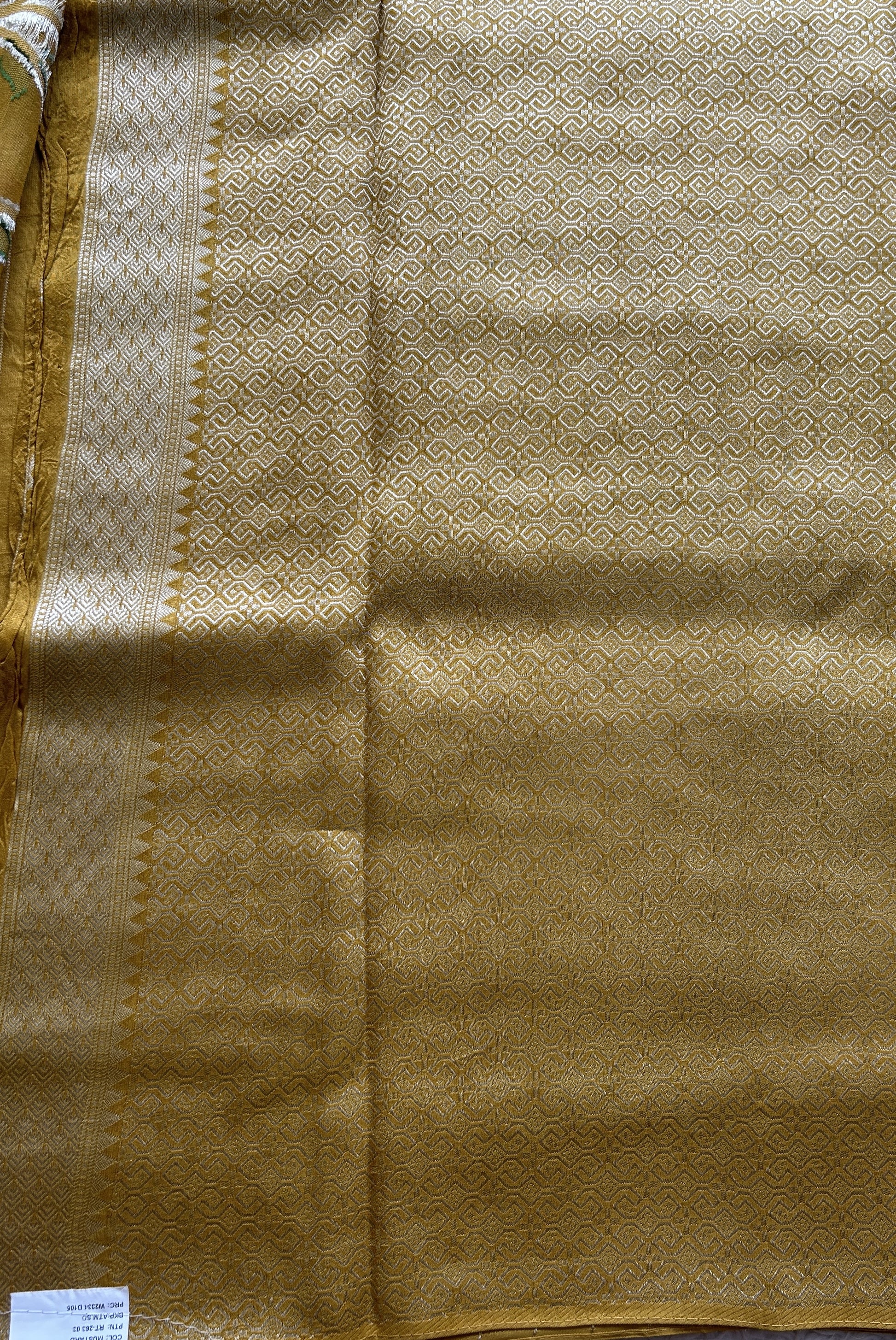Banarasi Tussar Georgette Saree Mustard Colored Paired with a Zari Border. - Sampradaya Designer Studio