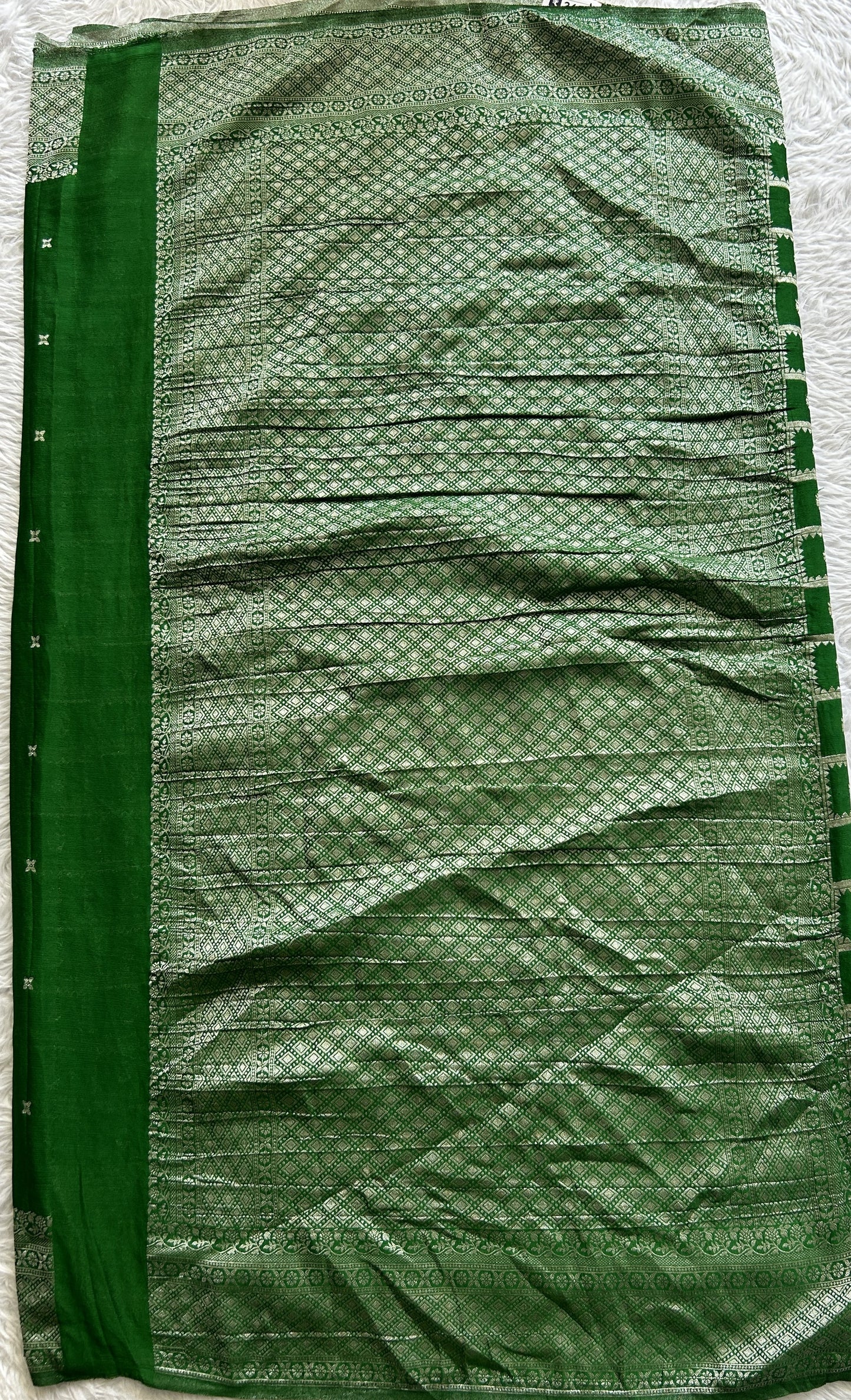 Semi Georgette Saree Green Colored Complemented with a Zari Border. - Sampradaya Designer Studio