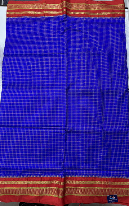 Narayanpet Silk Saree Blue Colored Complemented with a Red Zari Border.