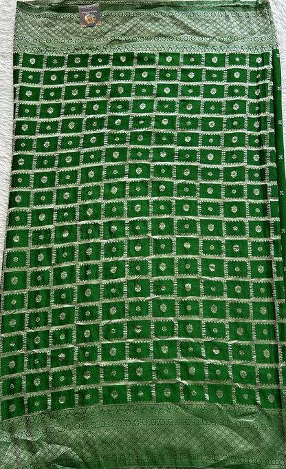 Semi Georgette Saree Green Colored Complemented with a Zari Border. - Sampradaya Designer Studio