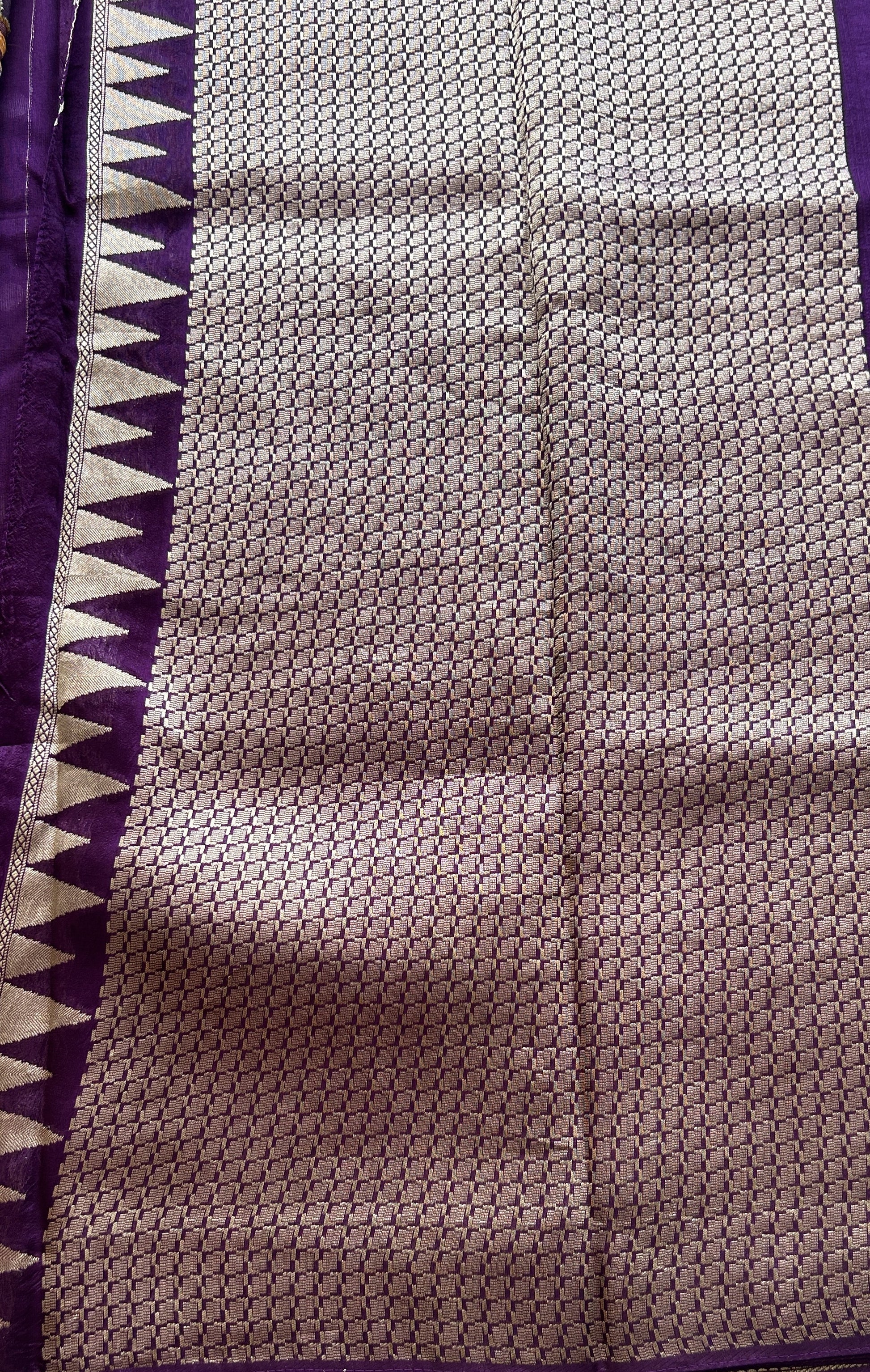 Banarasi Tussar Georgette Saree Dark Violet Colored Paired with a Temple Border. - Sampradaya Designer Studio