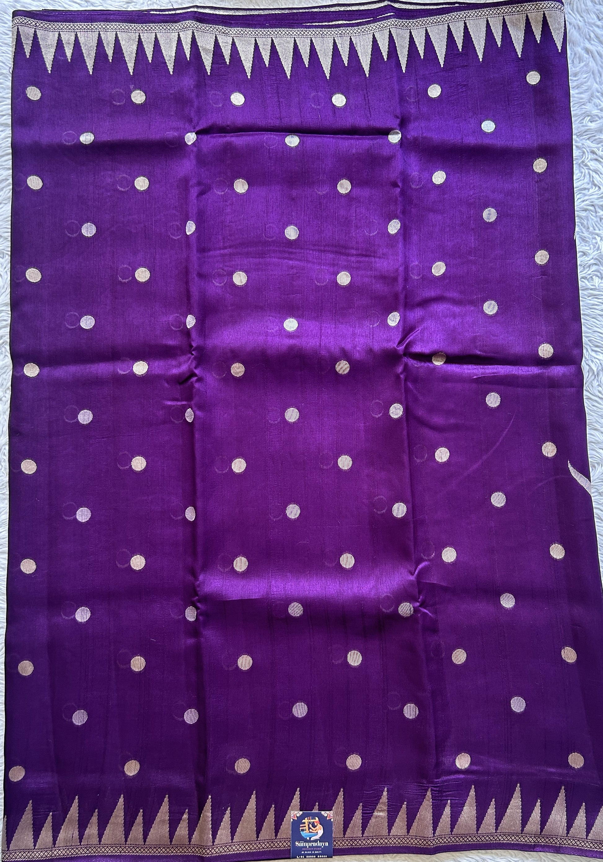 Banarasi Tussar Georgette Saree Dark Violet Colored Paired with a Temple Border. - Sampradaya Designer Studio