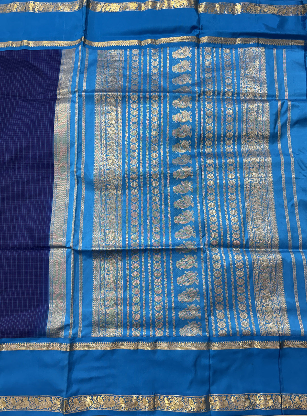 Narayanpet Silk Saree Navy Blue Colored Complemented with a Blue Zari Border.