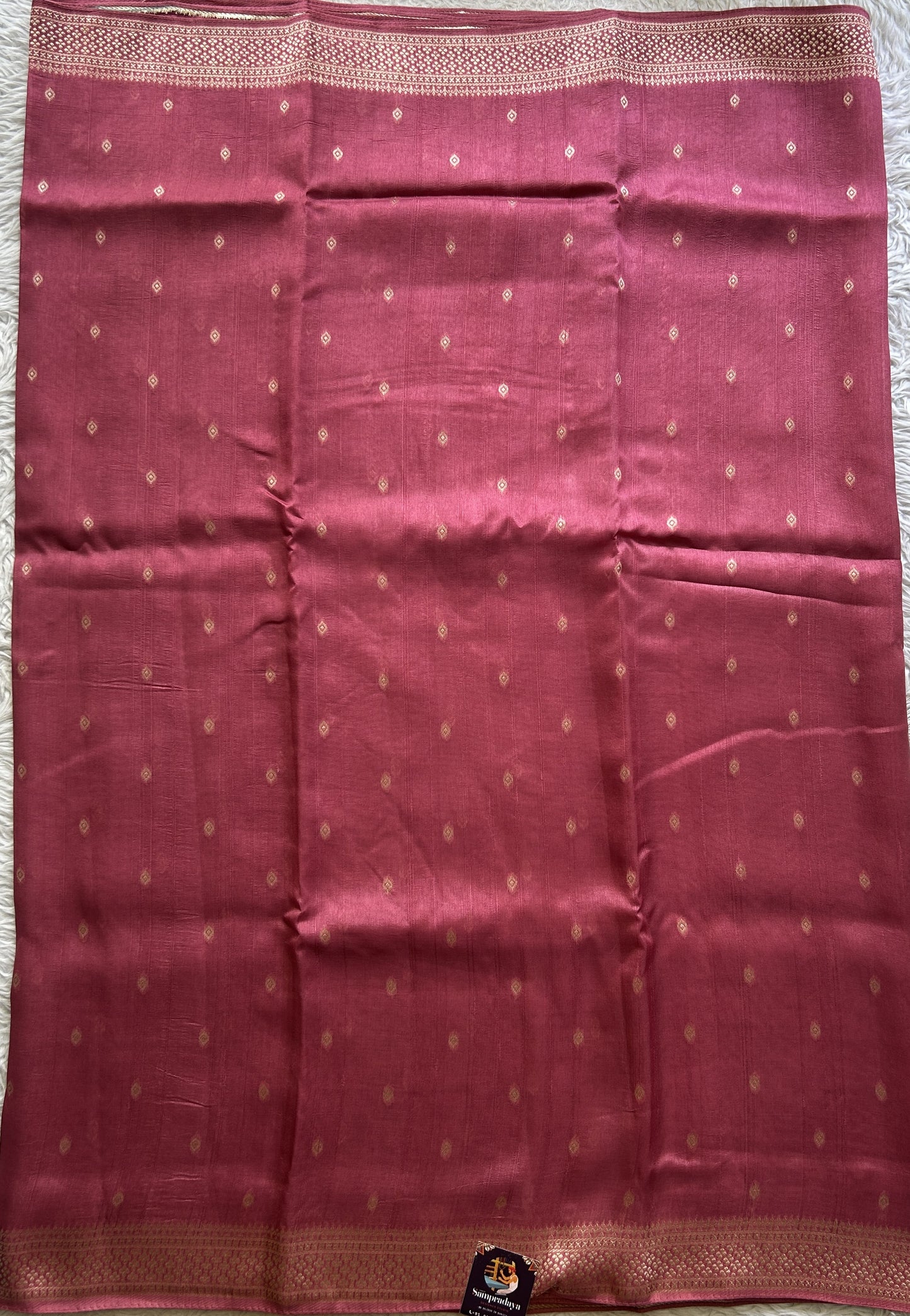 Banarasi Tussar Georgette Saree Dark Pink Colored Paired with a Zari Border. - Sampradaya Designer Studio