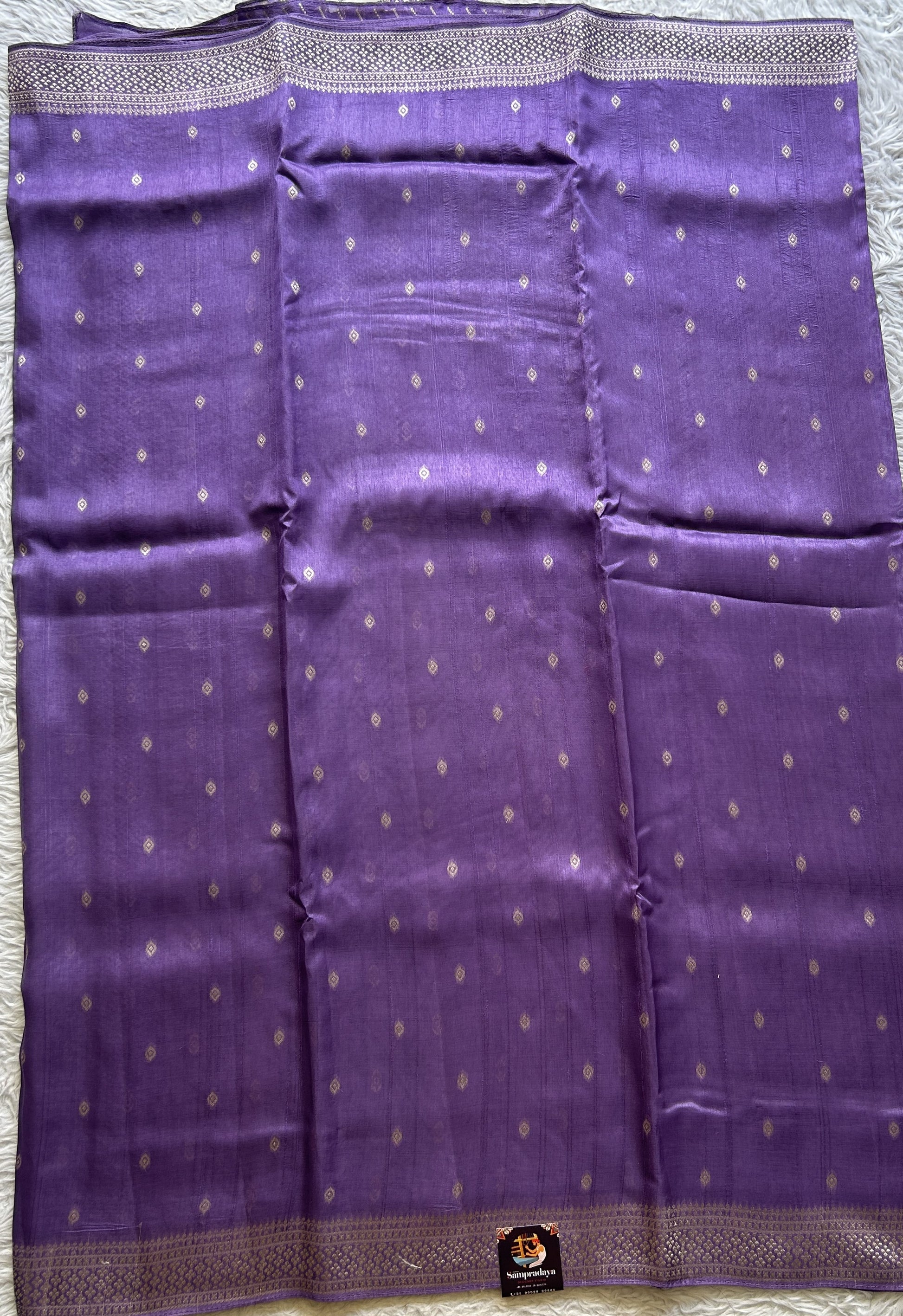 Banarasi Tussar Georgette Saree Lilac Colored Paired with a Zari Border. - Sampradaya Designer Studio