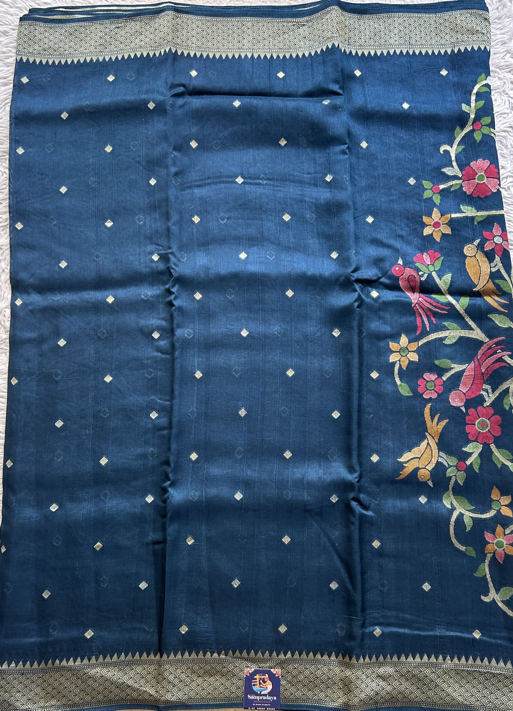 Banarasi Tussar Georgette Saree Peacock Blue Colored Paired with a Zari Border. - Sampradaya Designer Studio