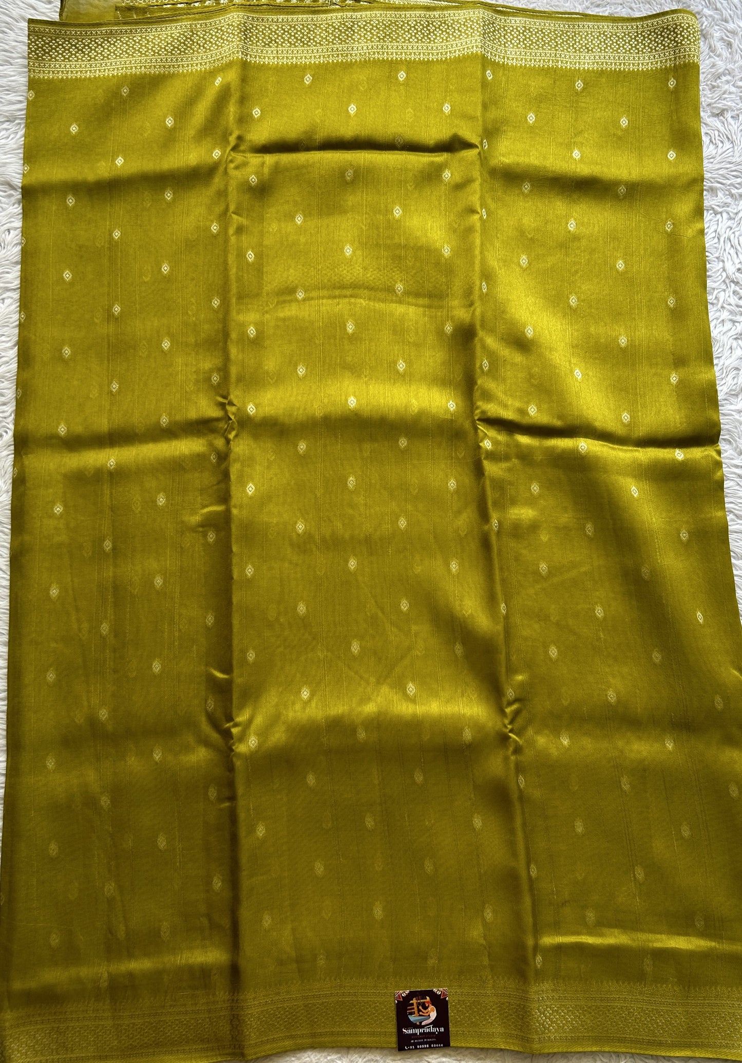 Banarasi Tussar Georgette Saree Pear Colored Paired with a Zari Border. - Sampradaya Designer Studio