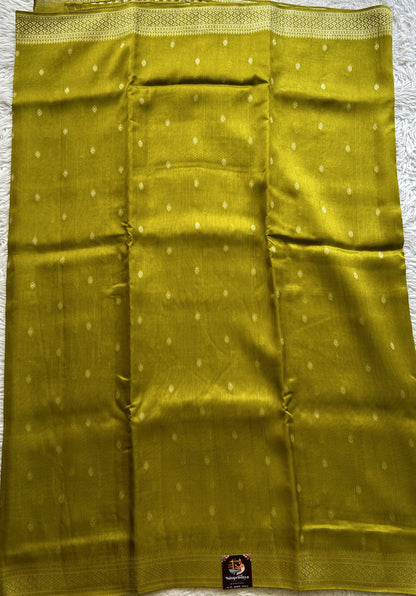 Banarasi Tussar Georgette Saree Pear Colored Paired with a Zari Border. - Sampradaya Designer Studio