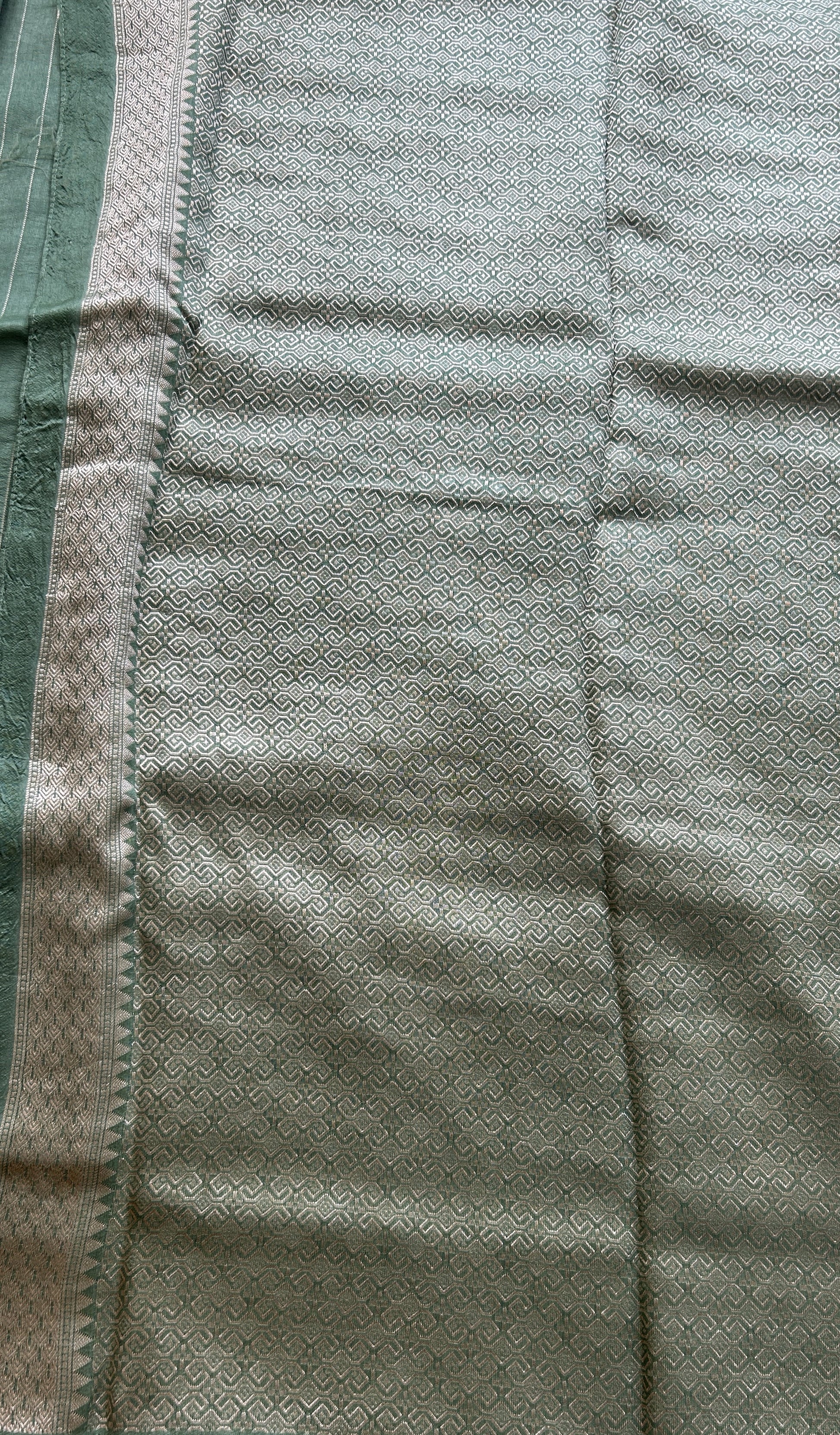 Banarasi Tussar Georgette Saree Sea Green Colored Paired with a Zari Border. - Sampradaya Designer Studio