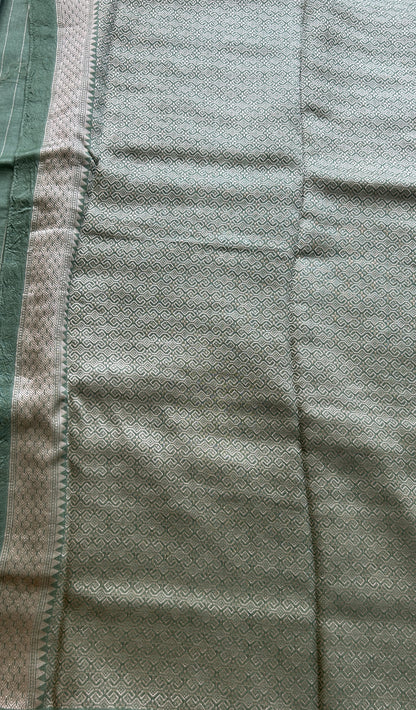 Banarasi Tussar Georgette Saree Sea Green Colored Paired with a Zari Border. - Sampradaya Designer Studio