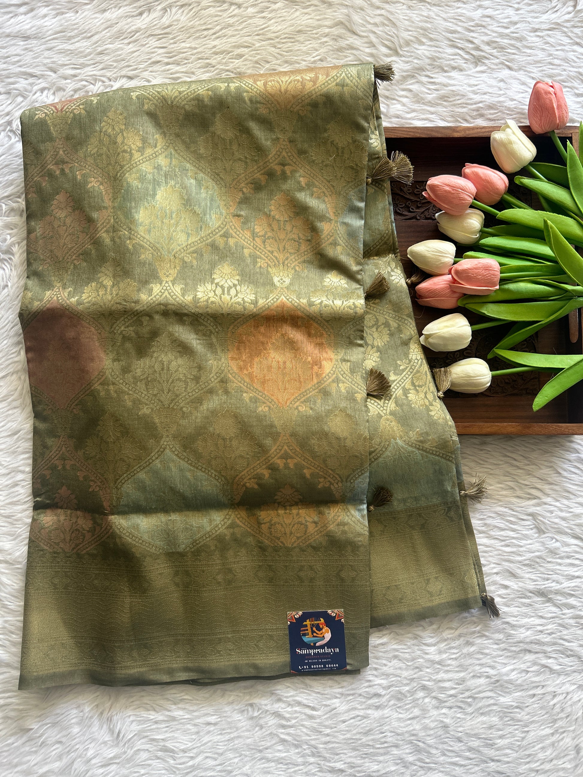 Semi Raw Silk Saree Olive Green Colored Complemented with a Zari Border. - Sampradaya Designer Studio
