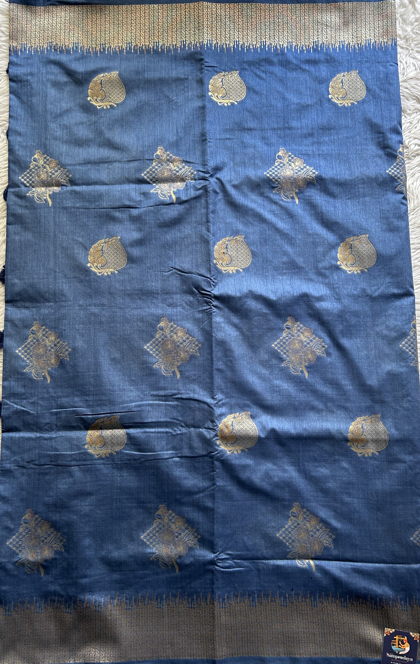 Semi Raw Silk Saree Ink Blue Colored Complemented with a Zari Border. - Sampradaya Designer Studio