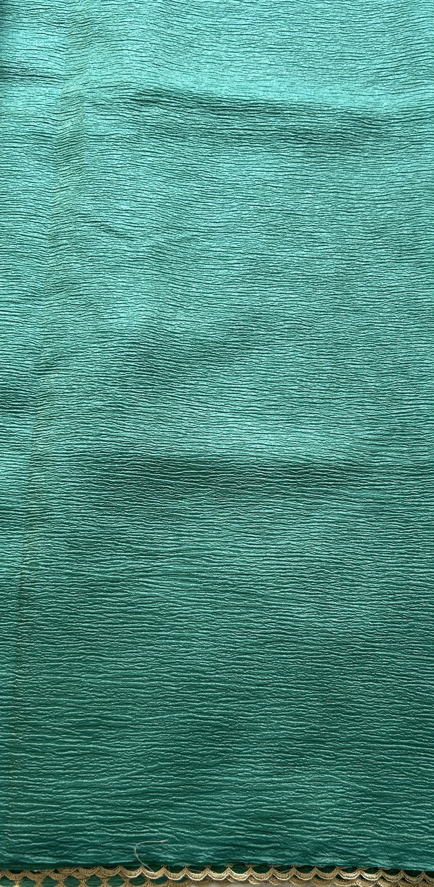 Banarasi Fancy Crushed Saree Bottle Green Colored Complemented with a Borderless. - Sampradaya Designer Studio
