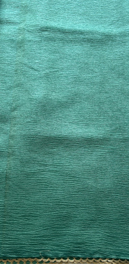 Banarasi Fancy Crushed Saree Bottle Green Colored Complemented with a Borderless. - Sampradaya Designer Studio