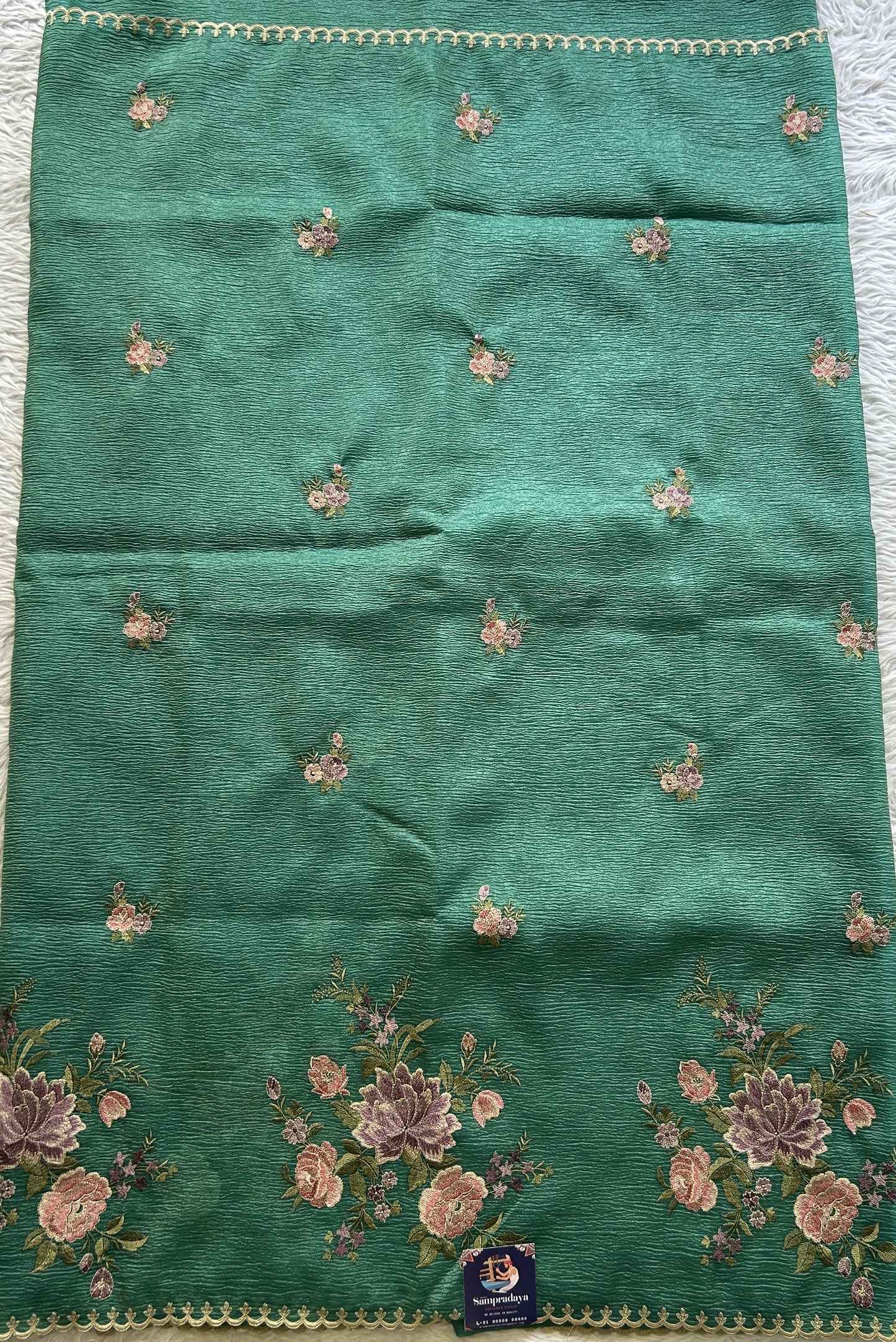 Banarasi Fancy Crushed Saree Bottle Green Colored Complemented with a Borderless. - Sampradaya Designer Studio