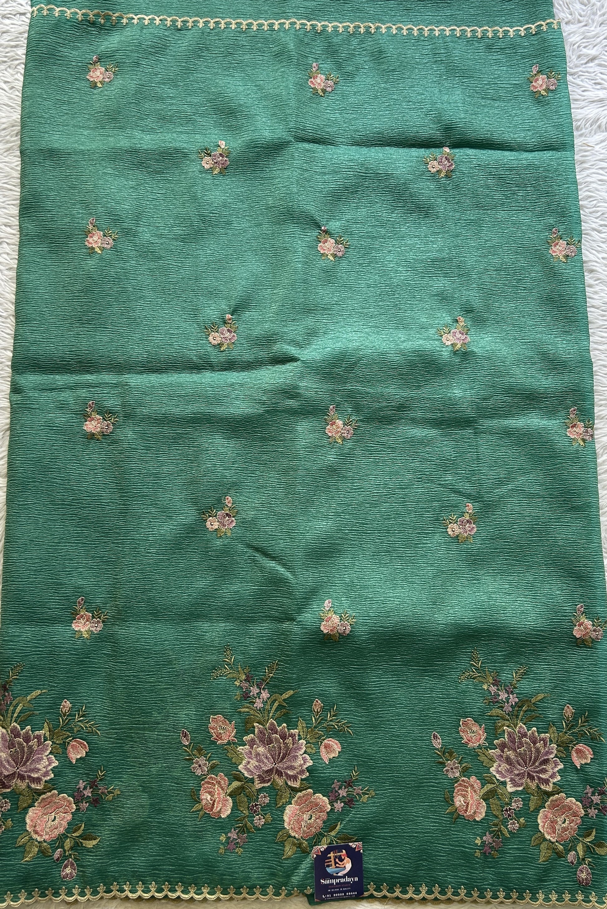 Banarasi Fancy Crushed Saree Bottle Green Colored Complemented with a Borderless. - Sampradaya Designer Studio