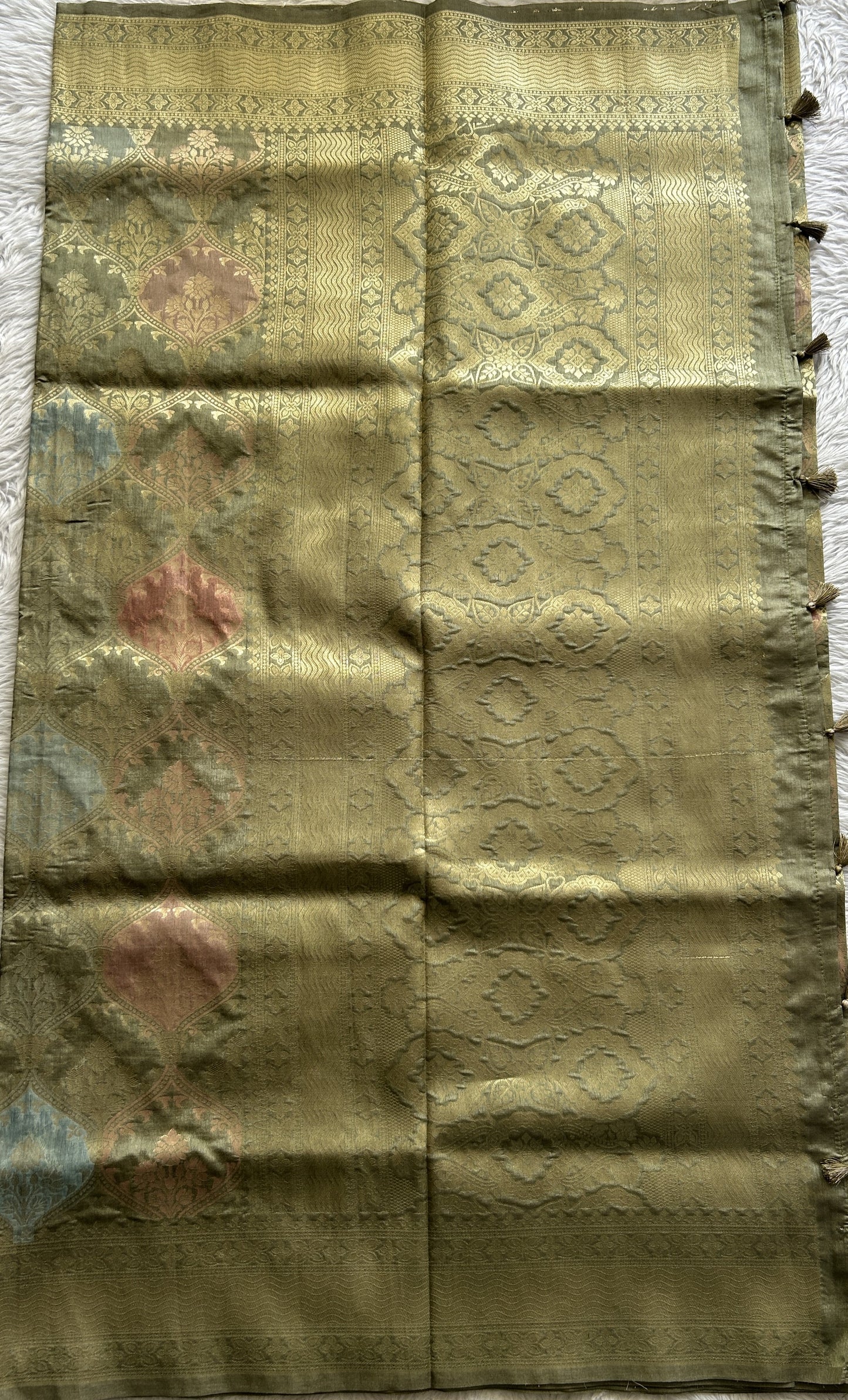 Semi Raw Silk Saree Olive Green Colored Complemented with a Zari Border. - Sampradaya Designer Studio