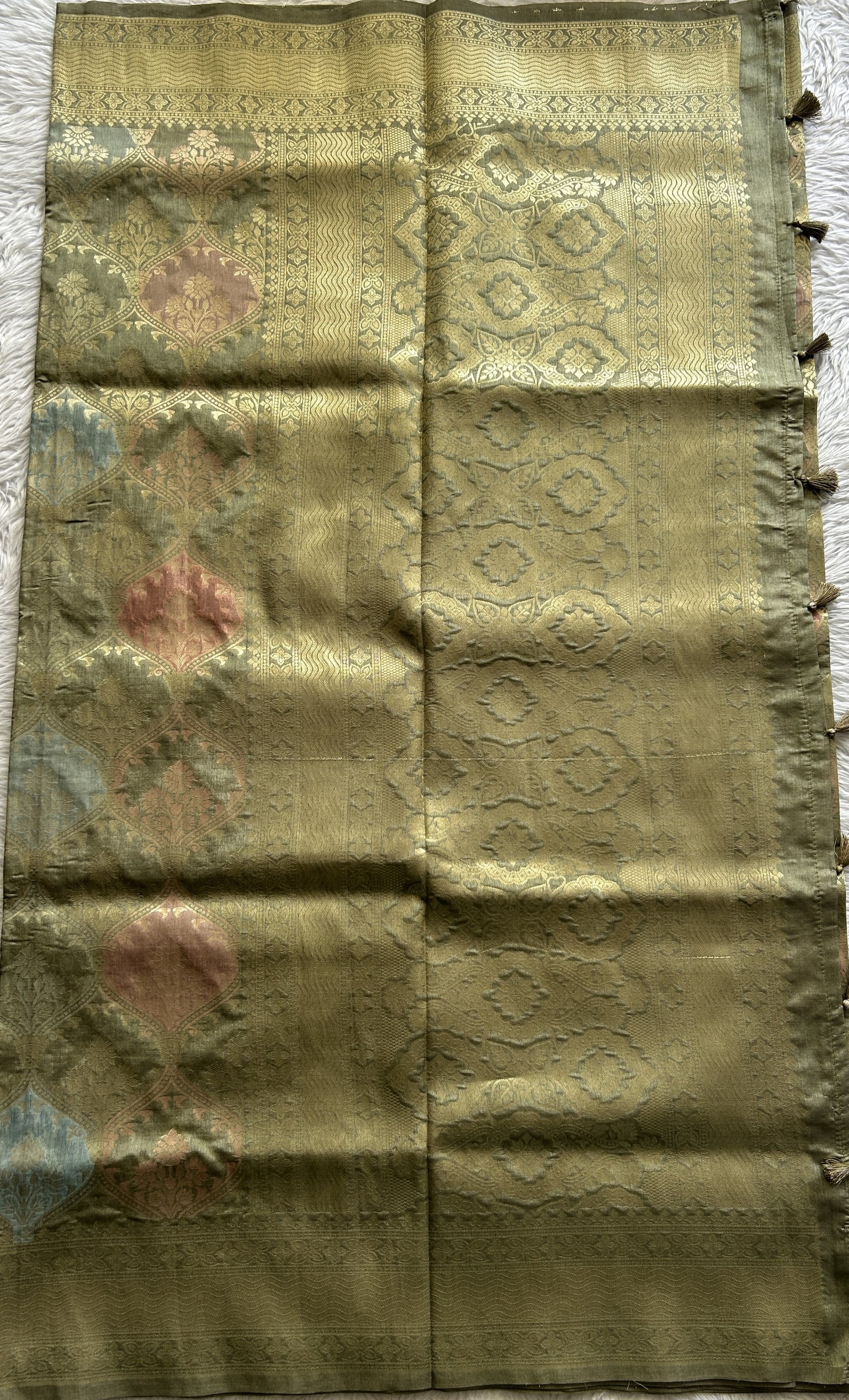 Semi Raw Silk Saree Olive Green Colored Complemented with a Zari Border. - Sampradaya Designer Studio