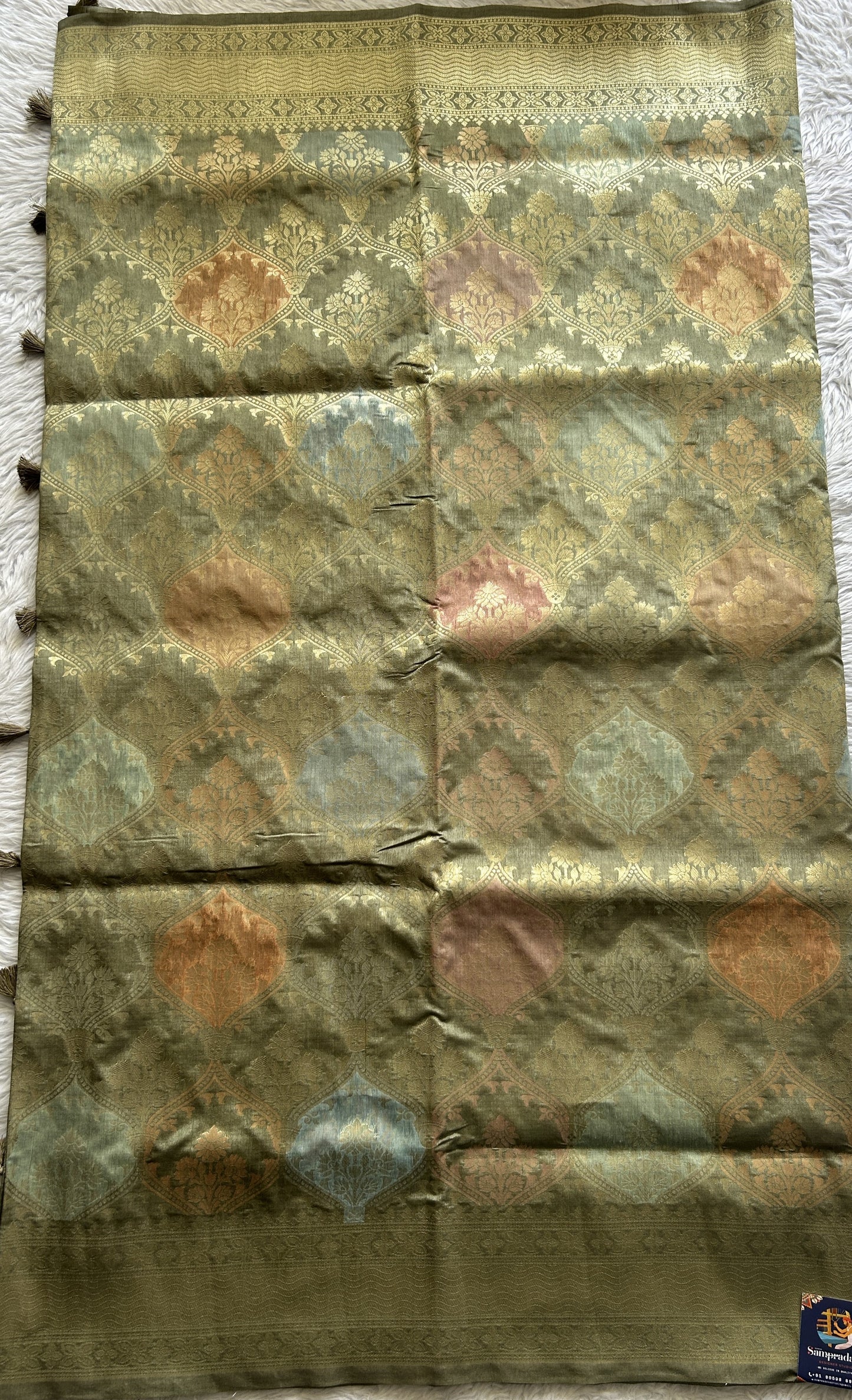 Semi Raw Silk Saree Olive Green Colored Complemented with a Zari Border. - Sampradaya Designer Studio