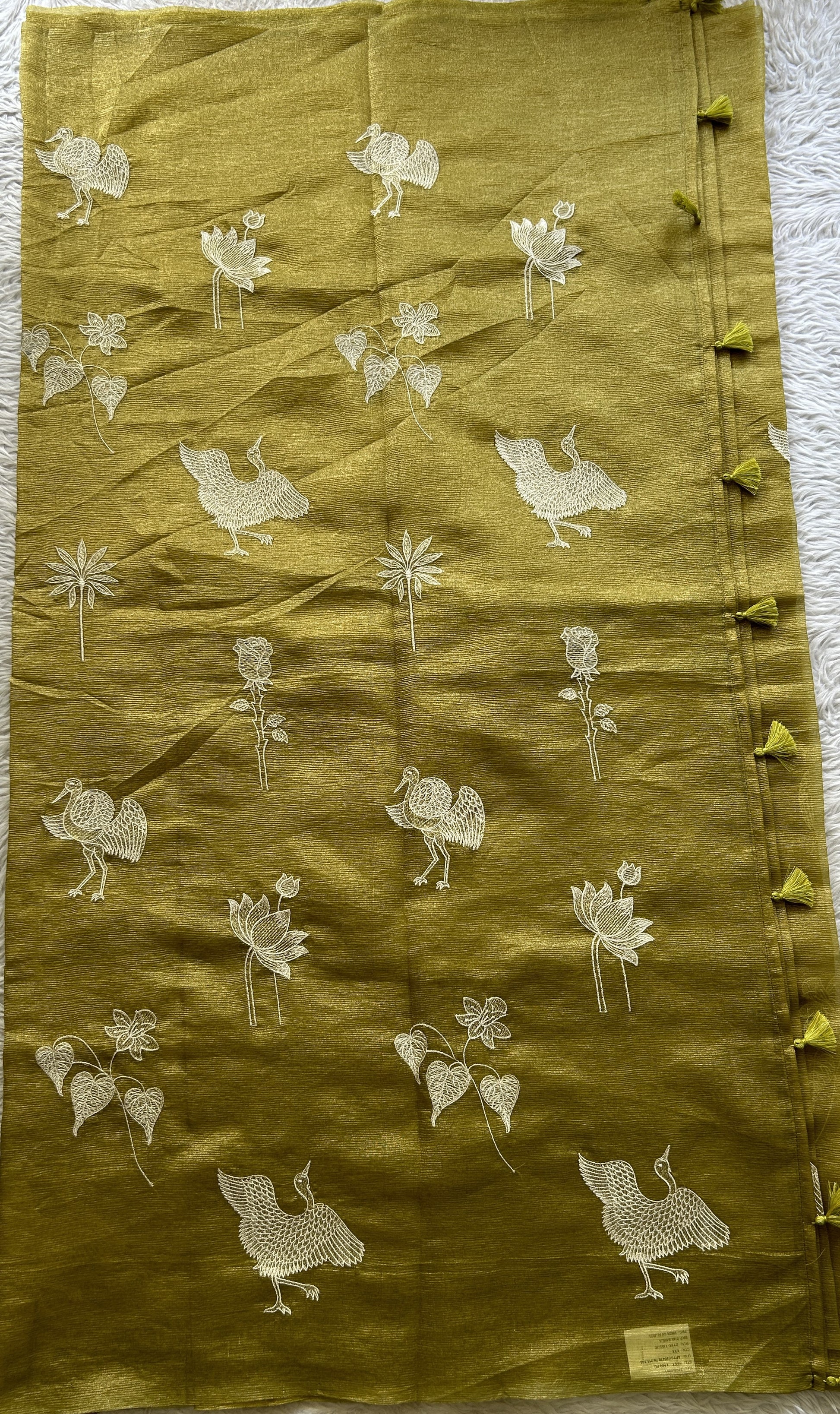 Banarasi Fancy Crushed Saree Leaf Green Colored Complemented with a Borderless. - Sampradaya Designer Studio