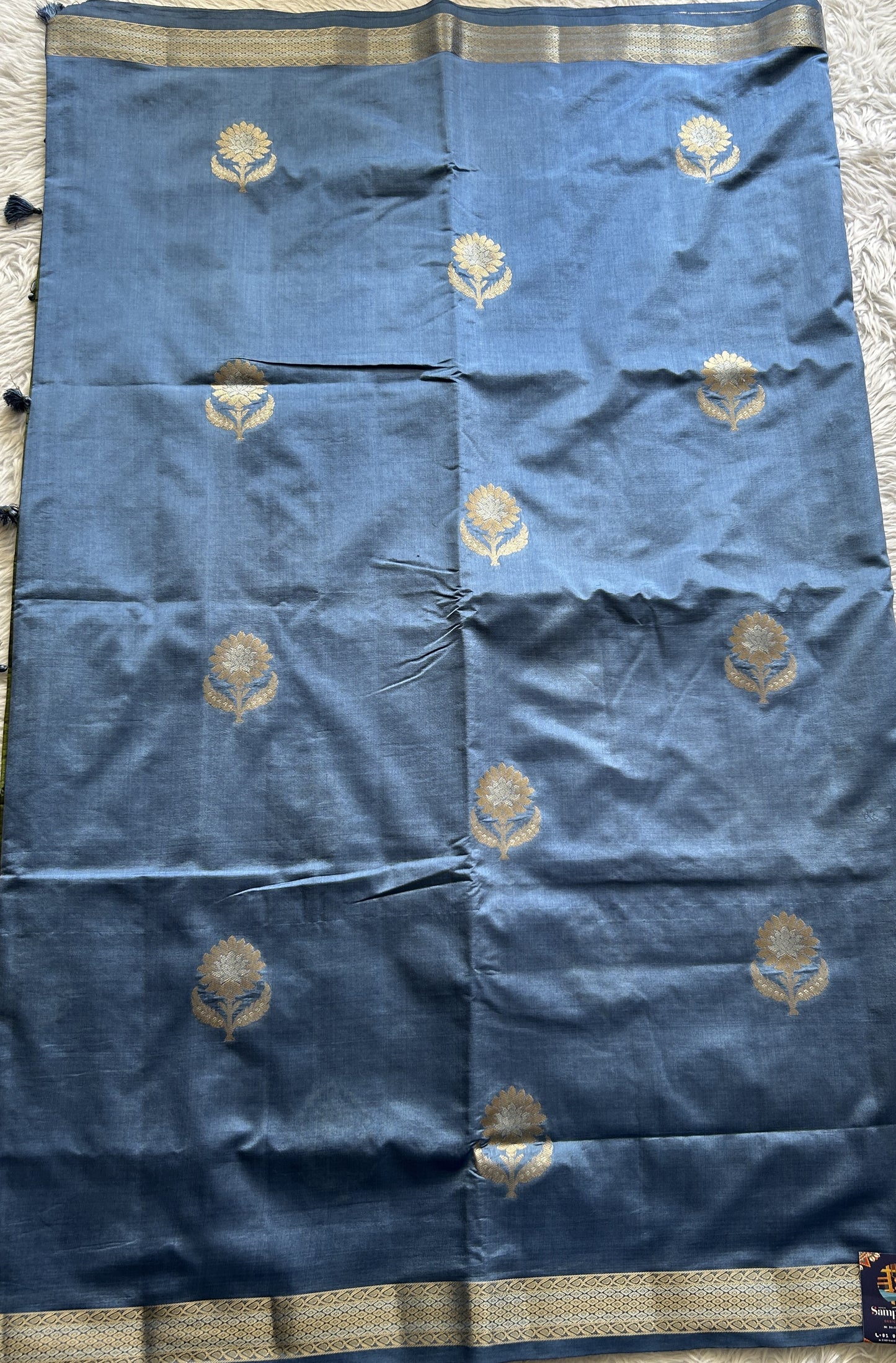 Semi Raw Silk Saree Blue Colored Complemented with a Zari Border. - Sampradaya Designer Studio
