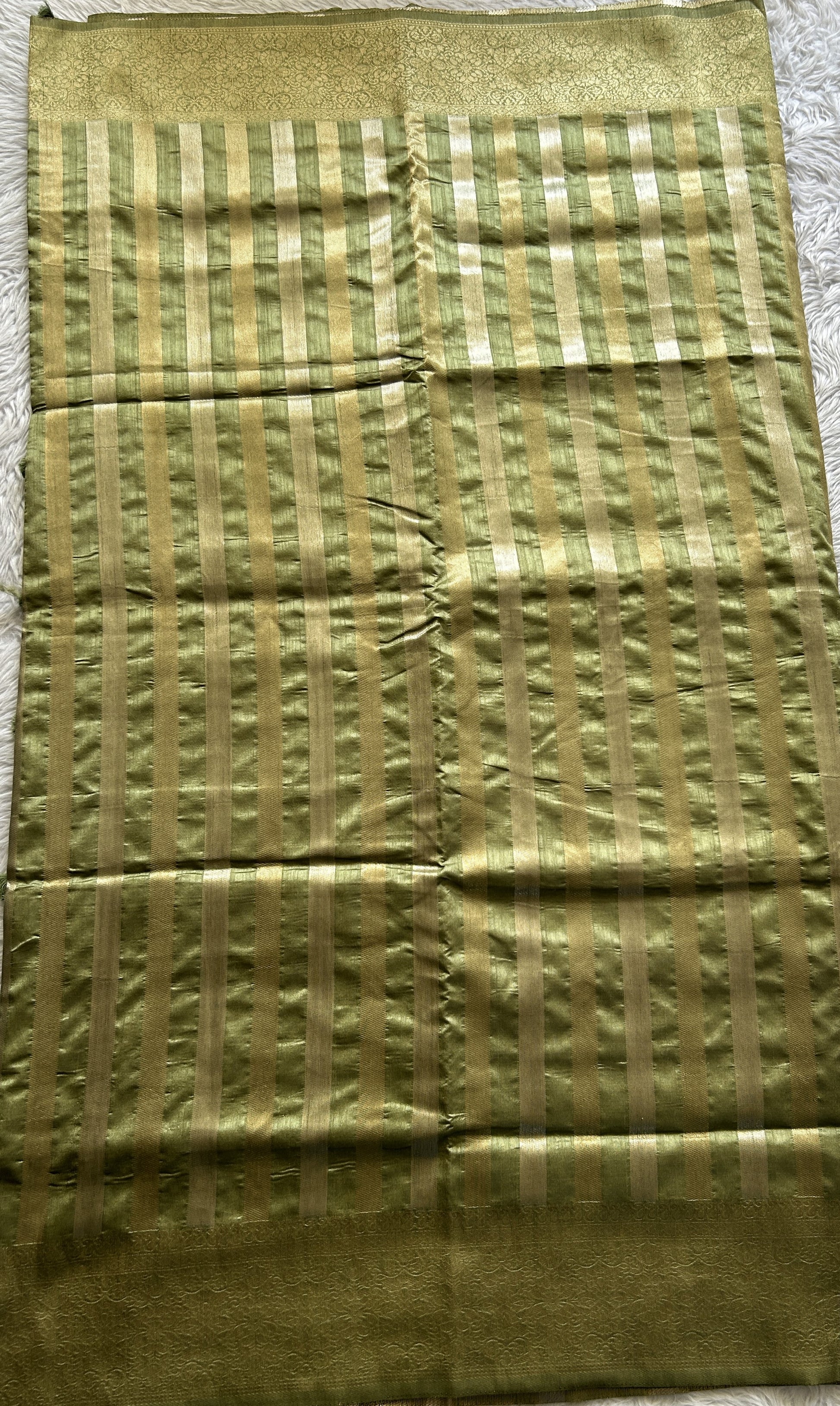 Semi Raw Silk Saree Parrot Green Colored Complemented with a Zari Border. - Sampradaya Designer Studio