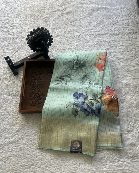 Dola Crepe Saree Light Sky Blue Colored Complemented with a Zari Border. - Sampradaya Designer Studio