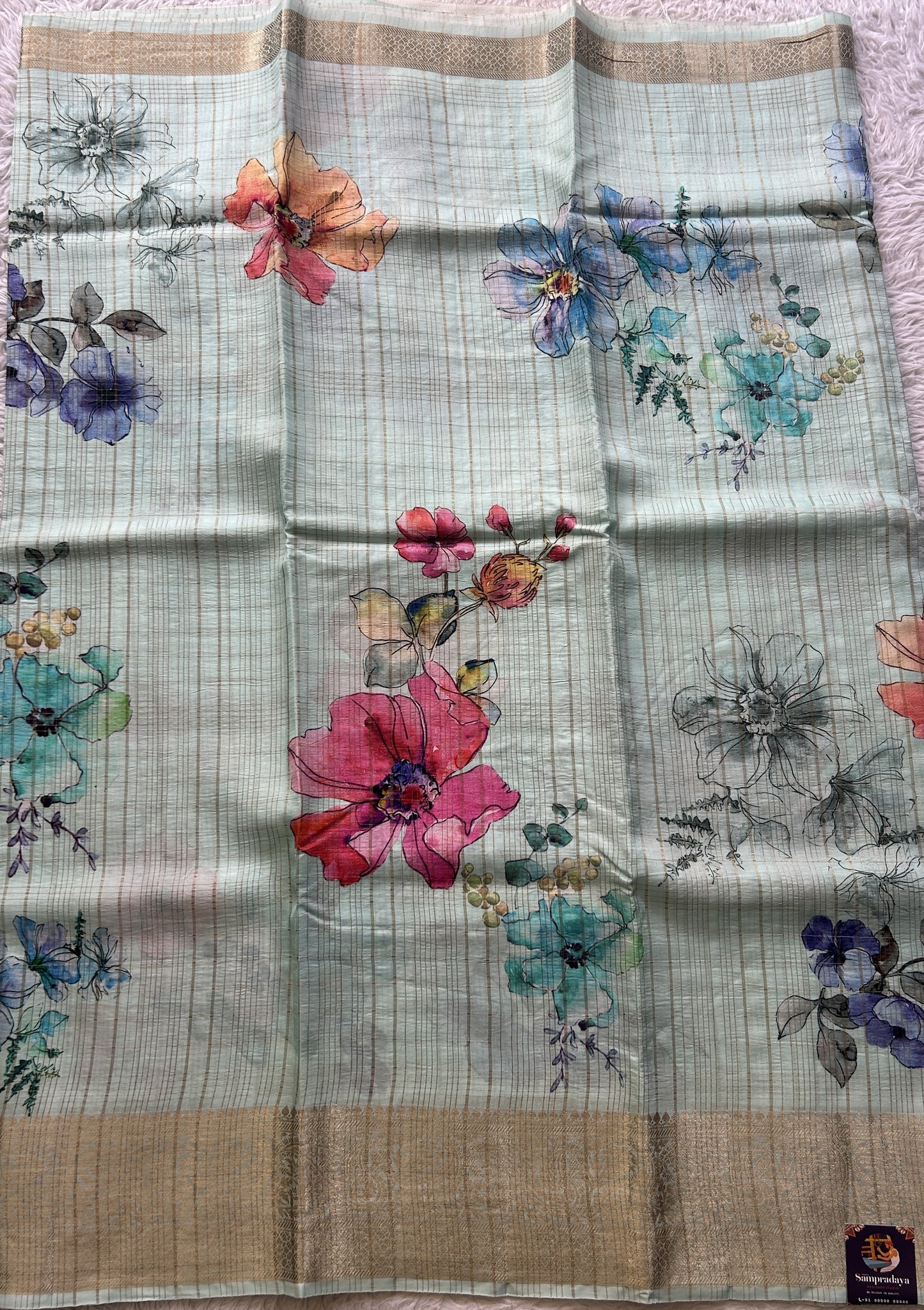 Dola Crepe Saree Light Sky Blue Colored Complemented with a Zari Border. - Sampradaya Designer Studio