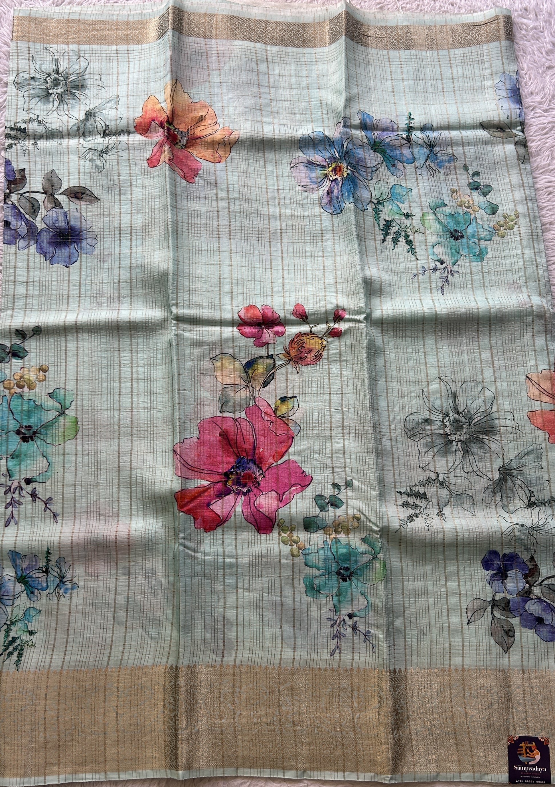 Dola Crepe Saree Light Sky Blue Colored Complemented with a Zari Border. - Sampradaya Designer Studio