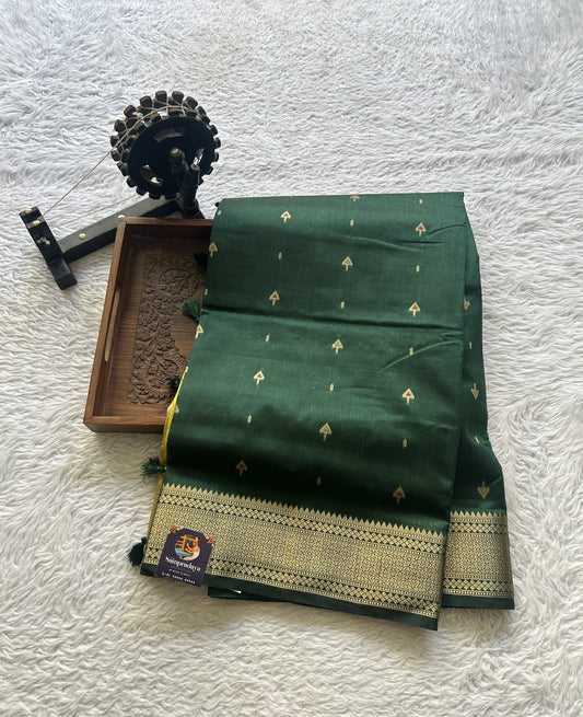 Semi Raw Silk Saree Dark Green Colored Elegantly Paired with a Zari Border. - Sampradaya Designer Studio