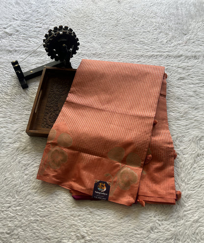 Semi Raw Silk Saree Peach Colored Elegantly Paired with a Zari Border. - Sampradaya Designer Studio