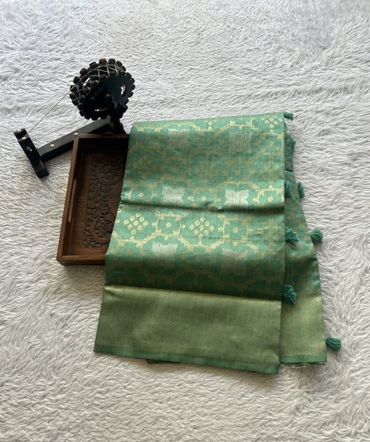 Semi Raw Silk Allover Saree Light Green Colored Elegantly Paired with a Zari Border. - Sampradaya Designer Studio