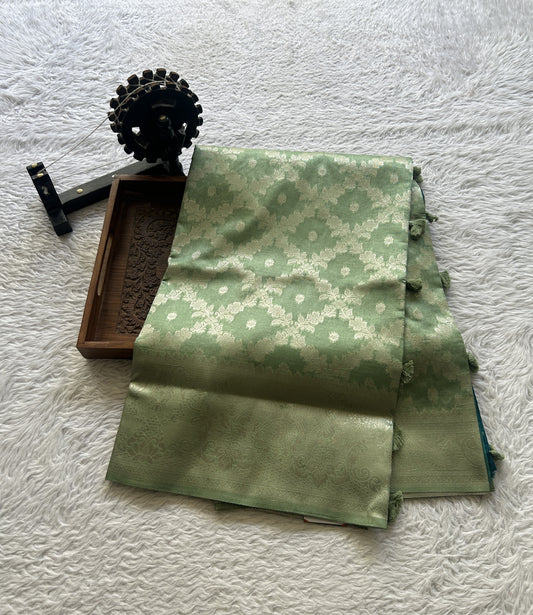 Semi Raw Silk Allover Saree Mint Green Colored Elegantly Paired with a Zari Border. - Sampradaya Designer Studio
