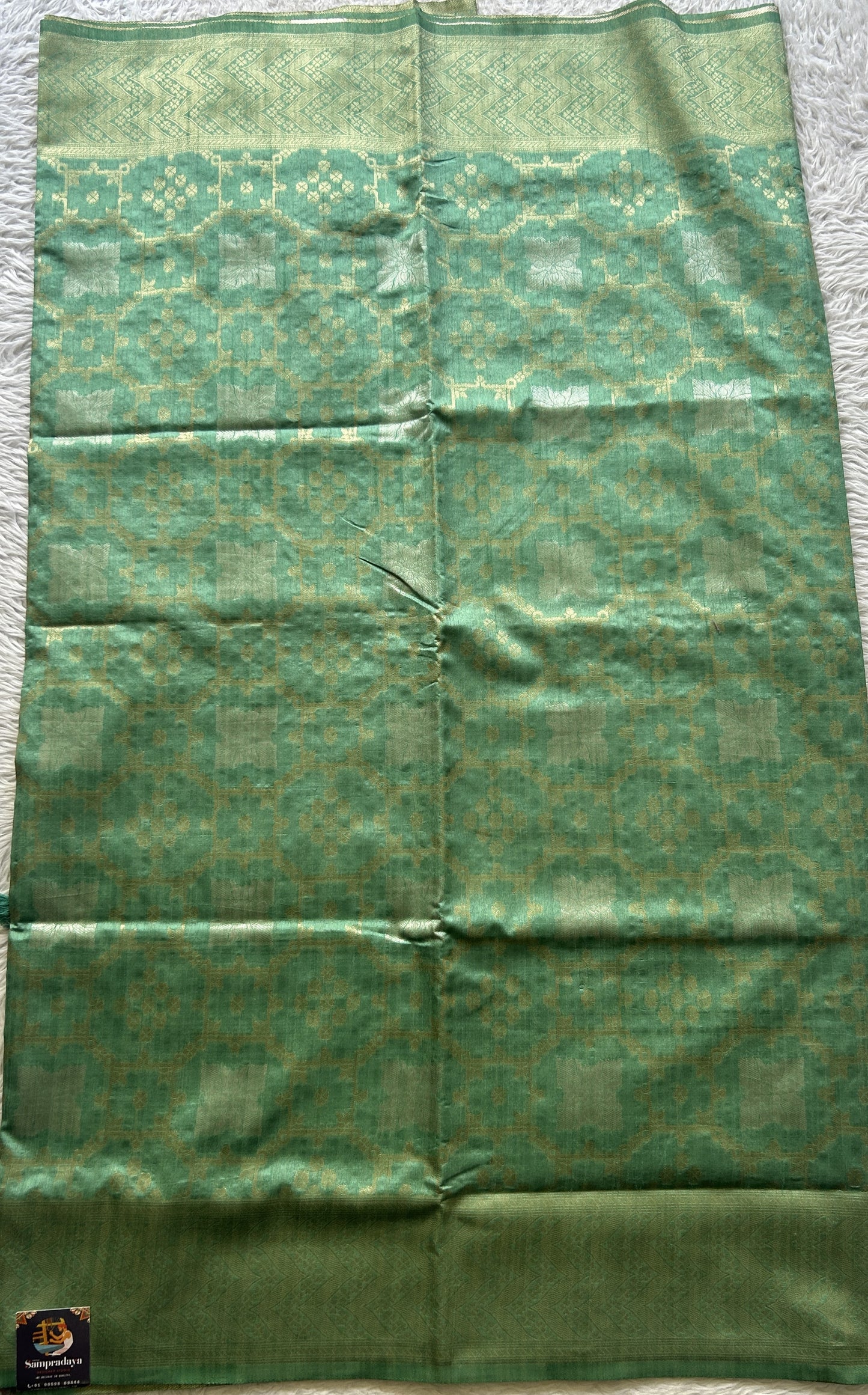 Semi Raw Silk Allover Saree Light Green Colored Elegantly Paired with a Zari Border. - Sampradaya Designer Studio